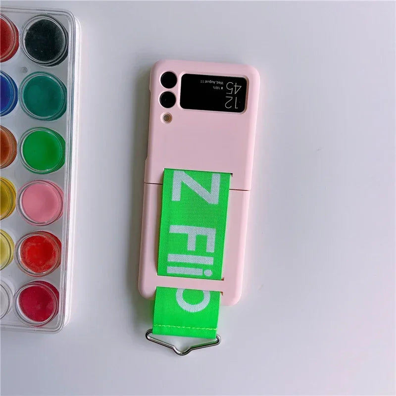 Wrist Strap Case For Samsung Galaxy Z Flip Series - Premium Mobile Phone Cases from Dressmycell.com - Just $17! Shop now at Dressmycell.com Wrist Strap Case For Samsung Galaxy Z Flip Series - Premium Mobile Phone Cases from Dressmycell.com - Just $17! Shop now at Dressmycell.com